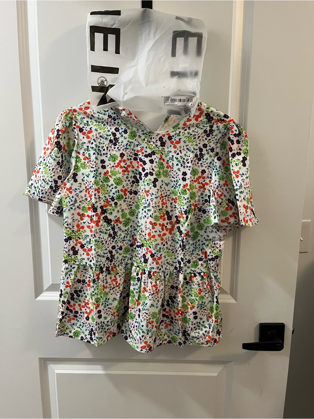 SHEIN White Floral Peplum Blouse with Green, Red, and Navy Print